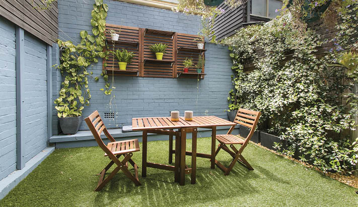 back yard with outdoor seating and barbecue with family  beautiful house