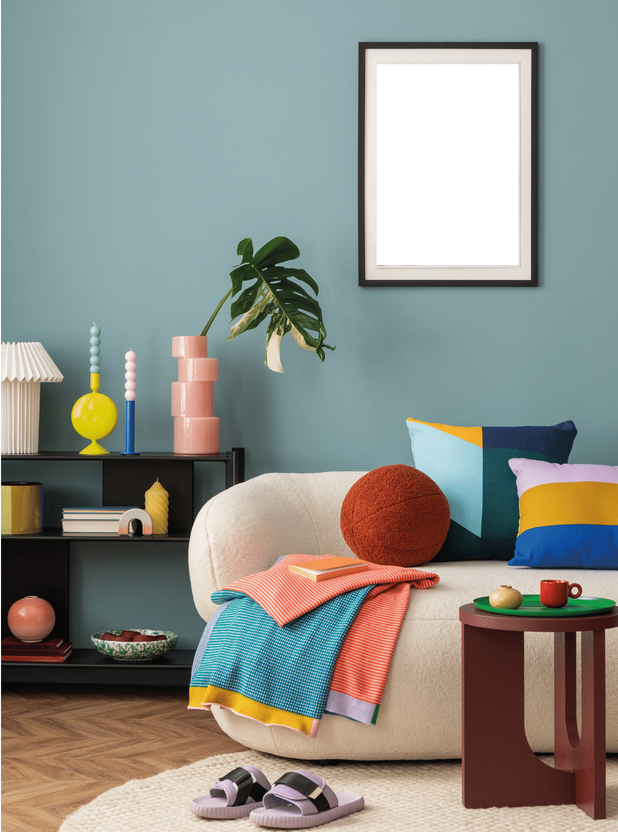 Interior desgin of modern living room interior with mock up poster frame, colorful decorations and accessories, plants, sofa, coffee table. Blue wall. Home decor. Template