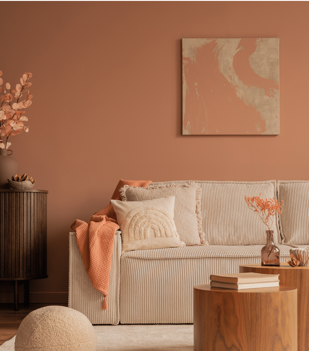 Interior design of living room with mock up poster frame, modular sofa, wooden coffee table, beige rug, books, pillows, wooden sideboard, pink wall and personal accessories. Home decor. Template.