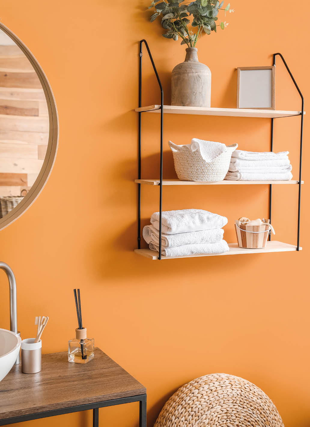 Stylish interior of modern bathroom with clean towels