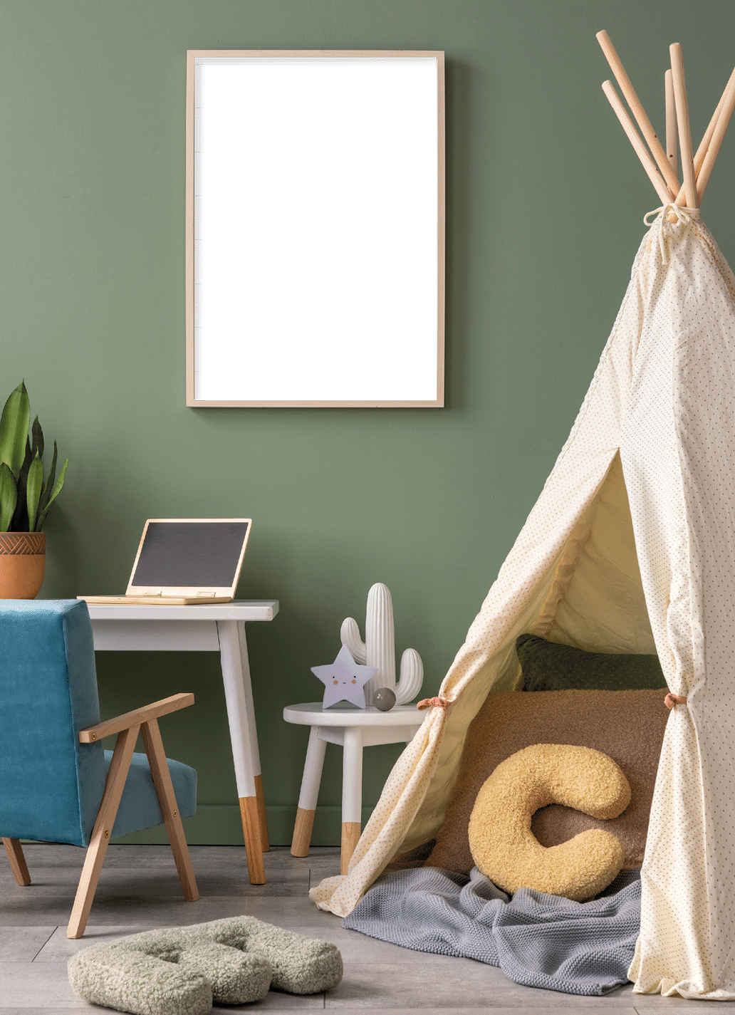 Stylish composition of cozy child room interior design with green wall with poster and armchair. Desk with computer and plant. Mock up poster. Pillow and bright carpet. Hut with pillows and plaid. 