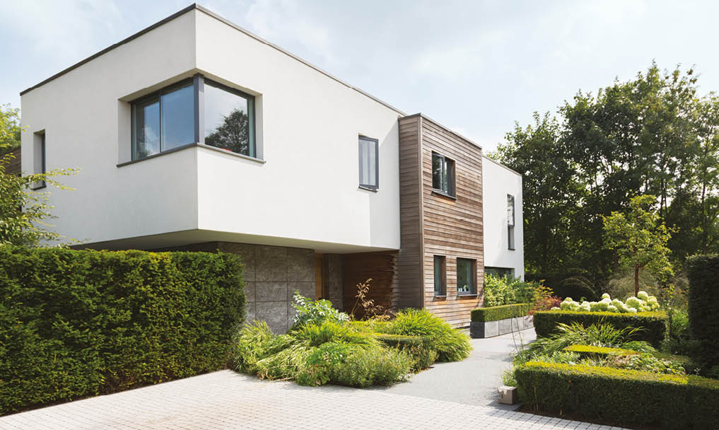Hedges around modern luxury house